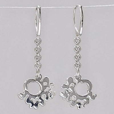 Back of Sun Moon Fine Silver Earring Dangles | < Z-FIRE.COM >  https://z-fire.com/products/sun-moon-earrings  Free Standard Shipping Free Astrological Report of Choice .999 Fine Silver sun moon dangles .925 Sterling Silver Lever Backs About 2 Inches Total Length About 5.5 cm in total length About .75 Inch Wide About 1.5 cm Wide Hassle Free returns